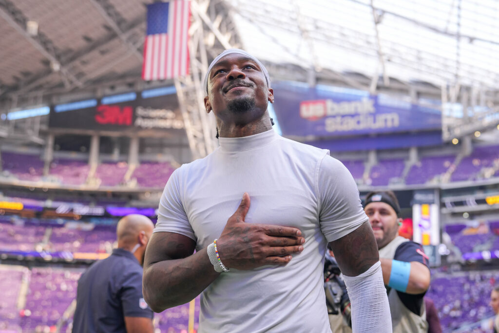 Houston Texans wide receiver Stefon Diggs (1) acknowledges fans after the game against the Minnesota Vikings at U.S. Bank Stadium.