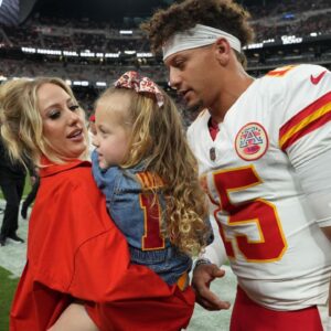 Kansas City Chiefs quarterback Patrick Mahomes (15) interacts with wife Brittany Mahomes and daughter Sterling Mahomes during the game against the Las Vegas Raiders at Allegiant Stadium.