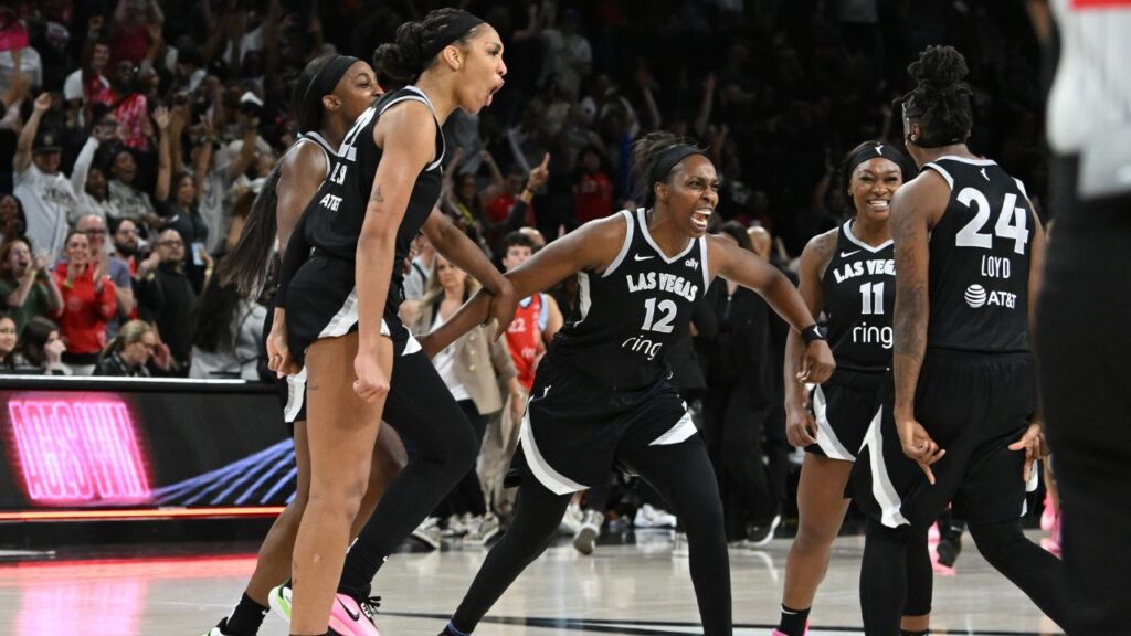 May 23, 2025; Las Vegas, Nevada, USA; Las Vegas Aces center A'ja Wilson (22), guard Jackie Young (0), guard Chelsea Gray (12), guard Dana Evans (11) and Jewell Loyd (24) celebrate defeating the Washington Mystics at Michelob Ultra Arena. Mandatory Credit: Candice Ward-Imagn Images