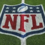 The NFL shield logo on the field at SoFi Stadium.