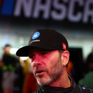 Feb 13, 2025; Daytona Beach, Florida, USA; NASCAR Cup Series driver Jimmie Johnson (84) during driver introductions for the Duels at Daytona International Speedway. Mandatory Credit: Peter Casey-Imagn Images