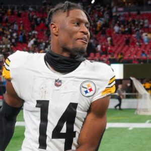 Pittsburgh Steelers wide receiver George Pickens (14) celebrates after a victory against the Atlanta Falcons at Mercedes-Benz Stadium.