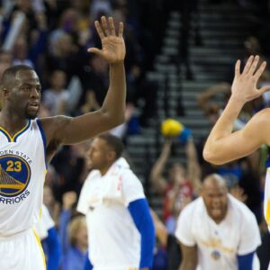 Mar 3, 2016; Oakland, CA, USA; Golden State Warriors forward Draymond Green (23) high fives guard Klay Thompson (11) after a play against the Oklahoma City Thunder during the fourth quarter at Oracle Arena. The Golden State Warriors defeated the Oklahoma City Thunder 121-106. Mandatory Credit: Kelley L Cox-Imagn Images