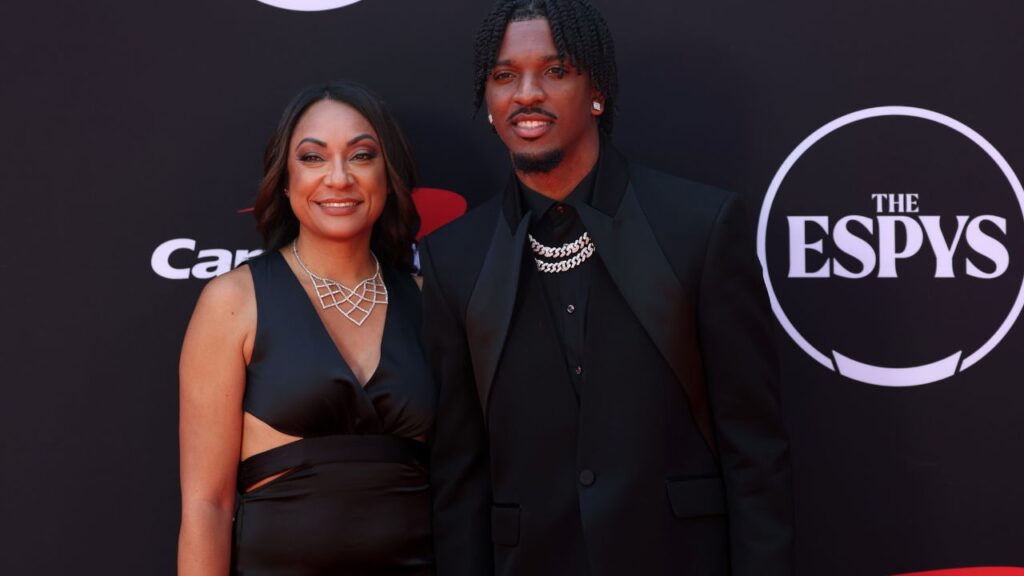 Washington Commanders quarterback Jayden Daniels and his mother Regina Jackson arrive on the red carpet before the 2024 ESPYS at Dolby Theatre.