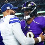 Dallas Cowboys quarterback Dak Prescott (4) hugs Baltimore Ravens quarterback Lamar Jackson (8) after the game at AT&T Stadium.