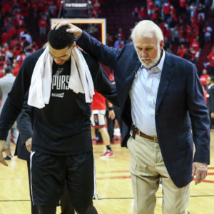 San Antonio Spurs guard Danny Green (14) and head coach Gregg Popovich (R) walk off the court after defeating the Houston Rockets in game six of the second round of the 2017 NBA Playoffs