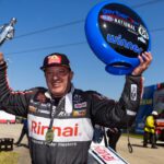 NHRA top fuel driver Tony Stewart celebrates after winning the Route 66 Nationals at Route 66 Raceway.