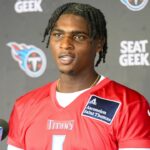 May 10, 2025; Nashville, TN, USA; Tennessee Titans quarterback Cam Ward (1) talks with reporters after his first day of rookie mini camp at Saint Thomas Sports Park.