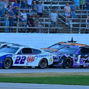 NASCAR Cup Series driver Kyle Larson (5) and driver Joey Logano (22) and driver Ross Chastain (1) and driver Ricky Stenhouse Jr. (47) drives during a restart of the Wurth 400 race at Texas Motor Speedway.