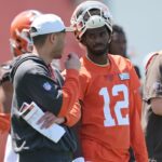Cleveland Browns quarterback Shedeur Sanders (12) waits his turn for a drill during rookie minicamp at CrossCountry Mortgage Campus.