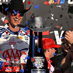 NASCAR Cup Series driver Joey Logano (22) celebrates in victory lane with the winner’s trophy after he wins the Wurth 400 race at Texas Motor Speedway.