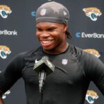 Jacksonville Jaguars wide receiver Travis Hunter (12) meets with the media following rookie minicamp at Miller Electric Center.