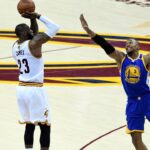 Cleveland Cavaliers forward LeBron James (23) shoots the ball against Golden State Warriors forward David West (3) during the second quarter in game three of the 2017 NBA Finals at Quicken Loans Arena.