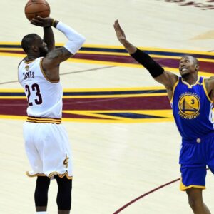 Cleveland Cavaliers forward LeBron James (23) shoots the ball against Golden State Warriors forward David West (3) during the second quarter in game three of the 2017 NBA Finals at Quicken Loans Arena.
