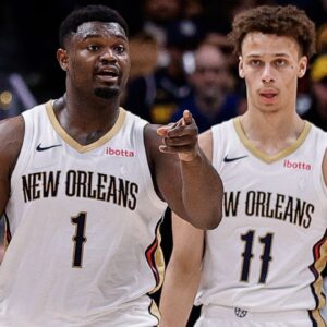 New Orleans Pelicans forward Zion Williamson (1) gestures ahead of guard Dyson Daniels (11) in the fourth quarter against the Denver Nuggets at Ball Arena.