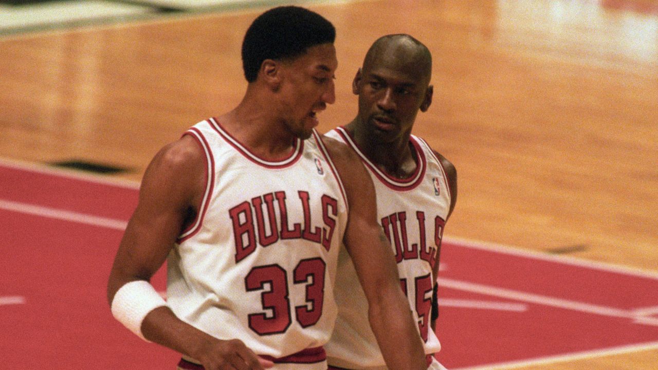 Mar 30, 1995; Chicago, IL, USA; Chicago Bulls guard Michael Jordan (45) talks with forward Scottie Pippen (33) after a timeout from the game against the Boston Celtics at Chicago Stadium. The Bulls beat the Celtics 100-82. Mandatory Credit: Matthew Emmons-USA TODAY Sports