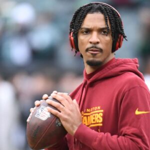 Washington Commanders quarterback Jayden Daniels (5) during warmups against the Philadelphia Eagles in the NFC Championship game at Lincoln Financial Field.