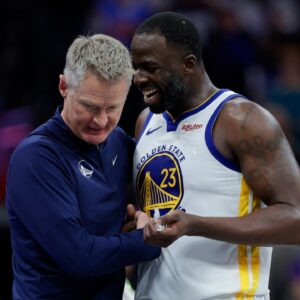 Golden State Warriors forward Draymond Green (23) talks with head coach Steve Kerr during the fourth quarter against the Sacramento Kings at Golden 1 Center.
