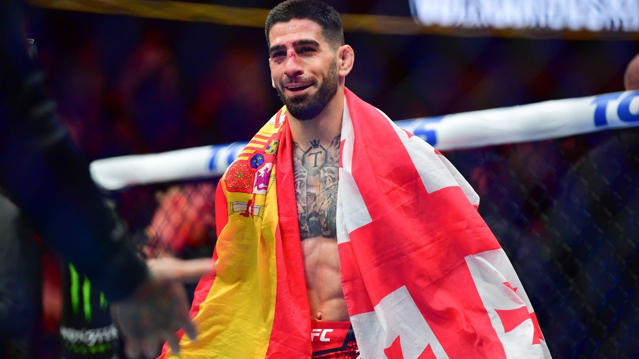 Ilia Topuria celebrates his championship victory against Alexander Volkanovski during UFC 298 at Honda Center.