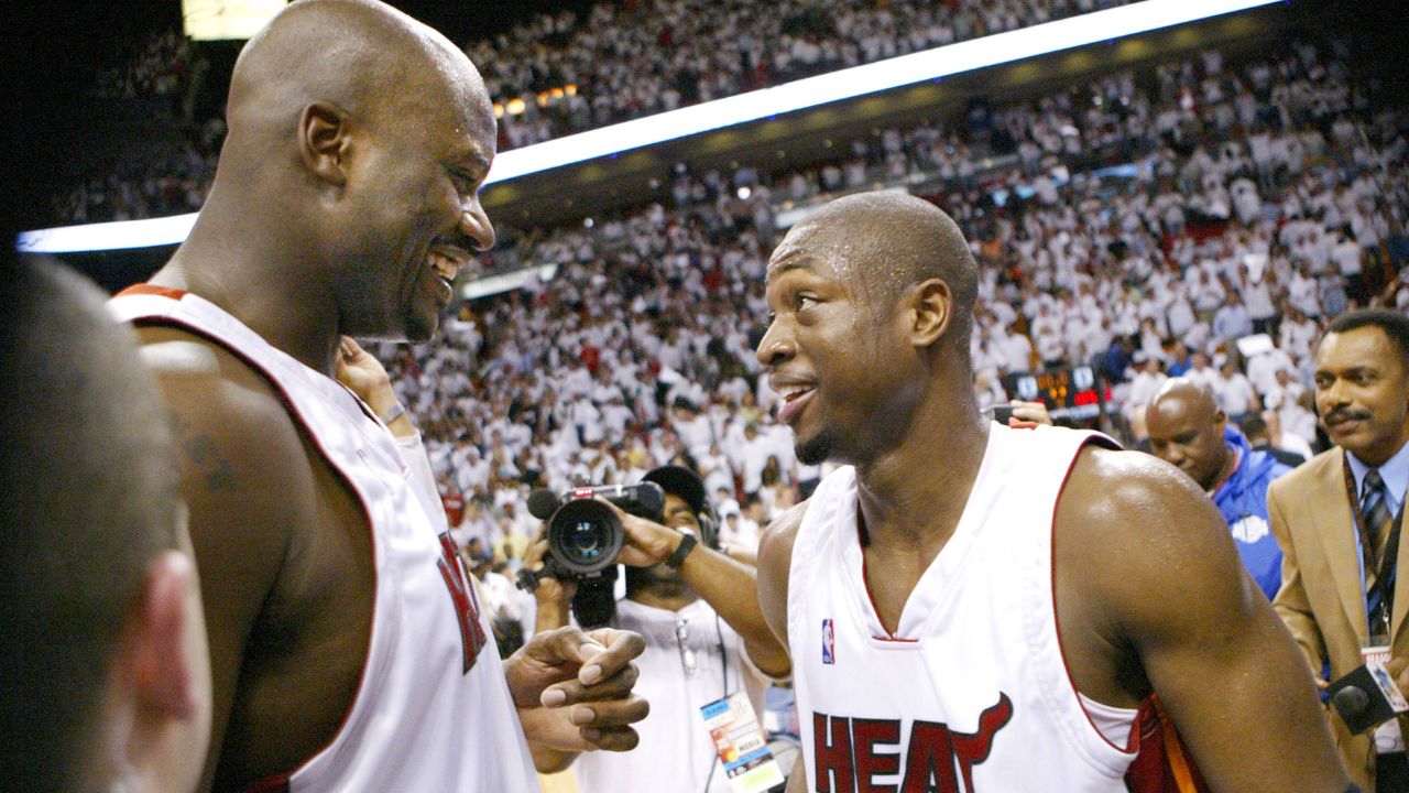 Miami Heat s Shaquille O Neal, left, and Dwyane Wade celebrate their 106-105 win over the New Jersey Nets during Game 5 of the second round of the NBA, Basketball Herren, USA Eastern Conference semifinals, on Tuesday, May 16, 2006.