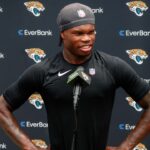 Jacksonville Jaguars wide receiver Travis Hunter (12) meets with the media following rookie minicamp at Miller Electric Center.