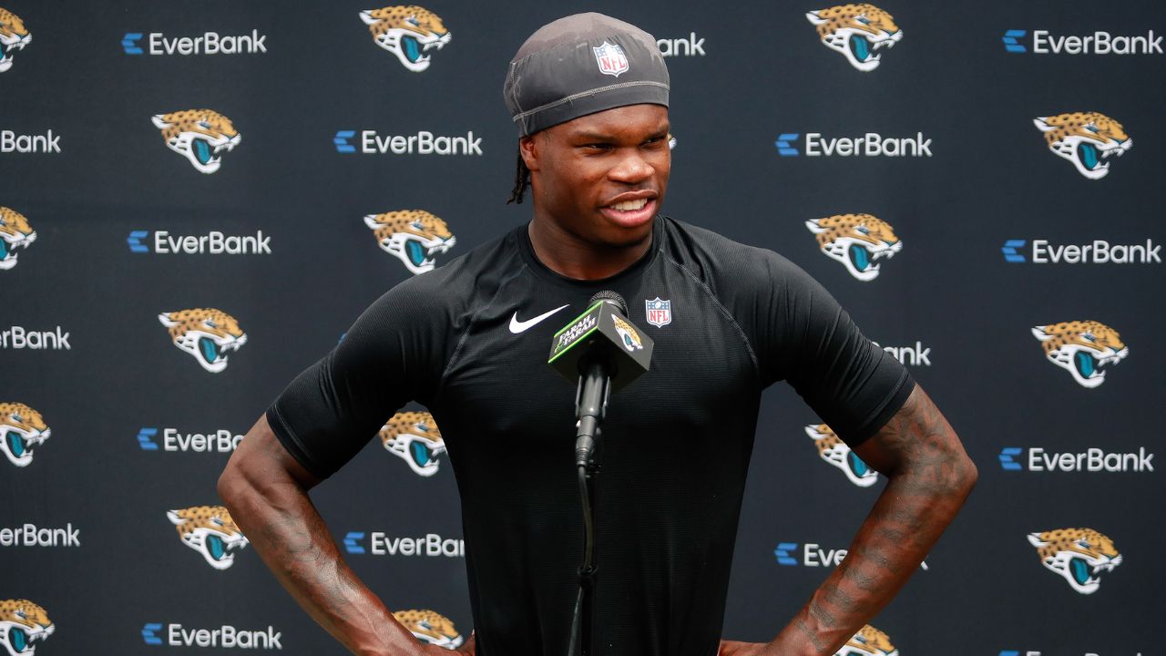 Jacksonville Jaguars wide receiver Travis Hunter (12) meets with the media following rookie minicamp at Miller Electric Center.