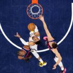 Denver Nuggets guard Russell Westbrook (4) shoots the ball against LA Clippers forward Kawhi Leonard (2) and guard Bogdan Bogdanovic (10) in the second half during game six of first round for the 2025 NBA Playoffs at Intuit Dome.