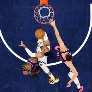 Denver Nuggets guard Russell Westbrook (4) shoots the ball against LA Clippers forward Kawhi Leonard (2) and guard Bogdan Bogdanovic (10) in the second half during game six of first round for the 2025 NBA Playoffs at Intuit Dome.