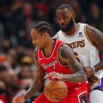 Dec 19, 2021; Chicago, Illinois, USA; Los Angeles Lakers forward LeBron James (6) defends against Chicago Bulls forward DeMar DeRozan (11) during the second half at United Center.