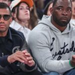 New York Giants quarterback Russell Wilson (l) and former NFL defensive end Justin Tuck (r) watch game five of first round for the 2025 NBA Playoffs between the Detroit Pistons and the New York Knicks at Madison Square Garden.