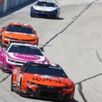 NASCAR Cup Series driver Daniel Suarez (99) leads driver Zane Smith (71) and driver Chase Elliott (9) during the NASCAR Cup Series AutoTrader EchoPark 400 at Texas Motor Speedway.