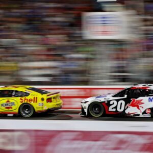 NASCAR Cup Series driver Joey Logano (22) and NASCAR Cup Series driver Christopher Bell (20) during NASCAR All-Star Race at North Wilkesboro Speedway.
