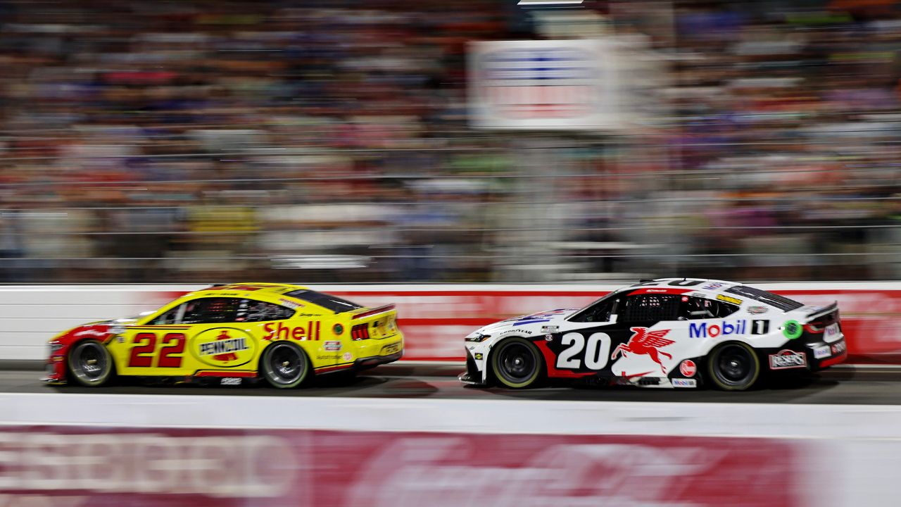 NASCAR Cup Series driver Joey Logano (22) and NASCAR Cup Series driver Christopher Bell (20) during NASCAR All-Star Race at North Wilkesboro Speedway.