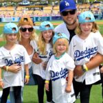 Los Angeles Rams quarterback Matthew Stafford (9) with his wife Kelly with their 4 daughters on the field prior to the game between the Los Angeles Dodgers and the Atlanta Braves at Dodger Stadium.