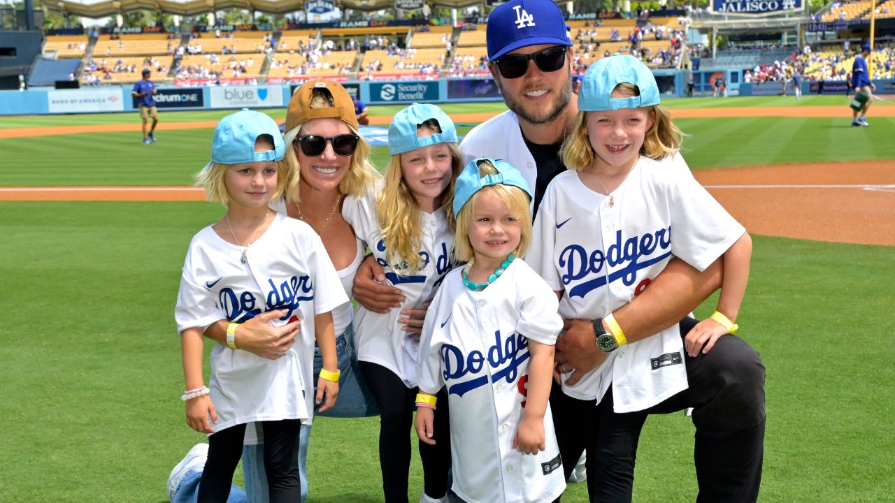 Los Angeles Rams quarterback Matthew Stafford (9) with his wife Kelly with their 4 daughters on the field prior to the game between the Los Angeles Dodgers and the Atlanta Braves at Dodger Stadium.