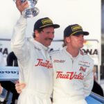 NASCAR driver Dale Earnhardt Sr and Dale Earnhardt Jr in victory lane after Earnhardt Sr. won the IROC race at Daytona International Speedway.