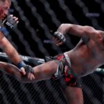 Jon Jones (red gloves) fights Stipe Miocic (blue gloves) in the heavyweight bout during UFC 309 at Madison Square Garden.