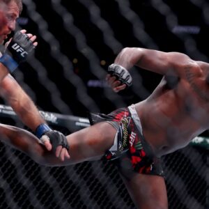 Jon Jones (red gloves) fights Stipe Miocic (blue gloves) in the heavyweight bout during UFC 309 at Madison Square Garden.
