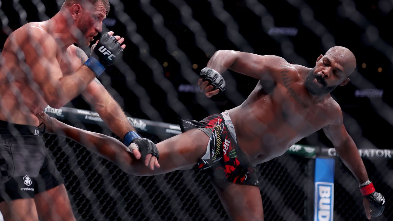 Jon Jones (red gloves) fights Stipe Miocic (blue gloves) in the heavyweight bout during UFC 309 at Madison Square Garden.