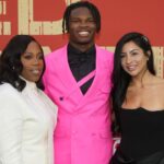 Colorado Buffaloes wide receiver Travis Hunter with his mother Ferrante Harris and his fiancee Leanna Lenee on the red carpet before the 2025 NFL Draft at Lambeau Field.
