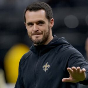 Dec 29, 2024; New Orleans, Louisiana, USA; New Orleans Saints quarterback Derek Carr (4) walks the field before a game against the Las Vegas Raiders at Caesars Superdome.