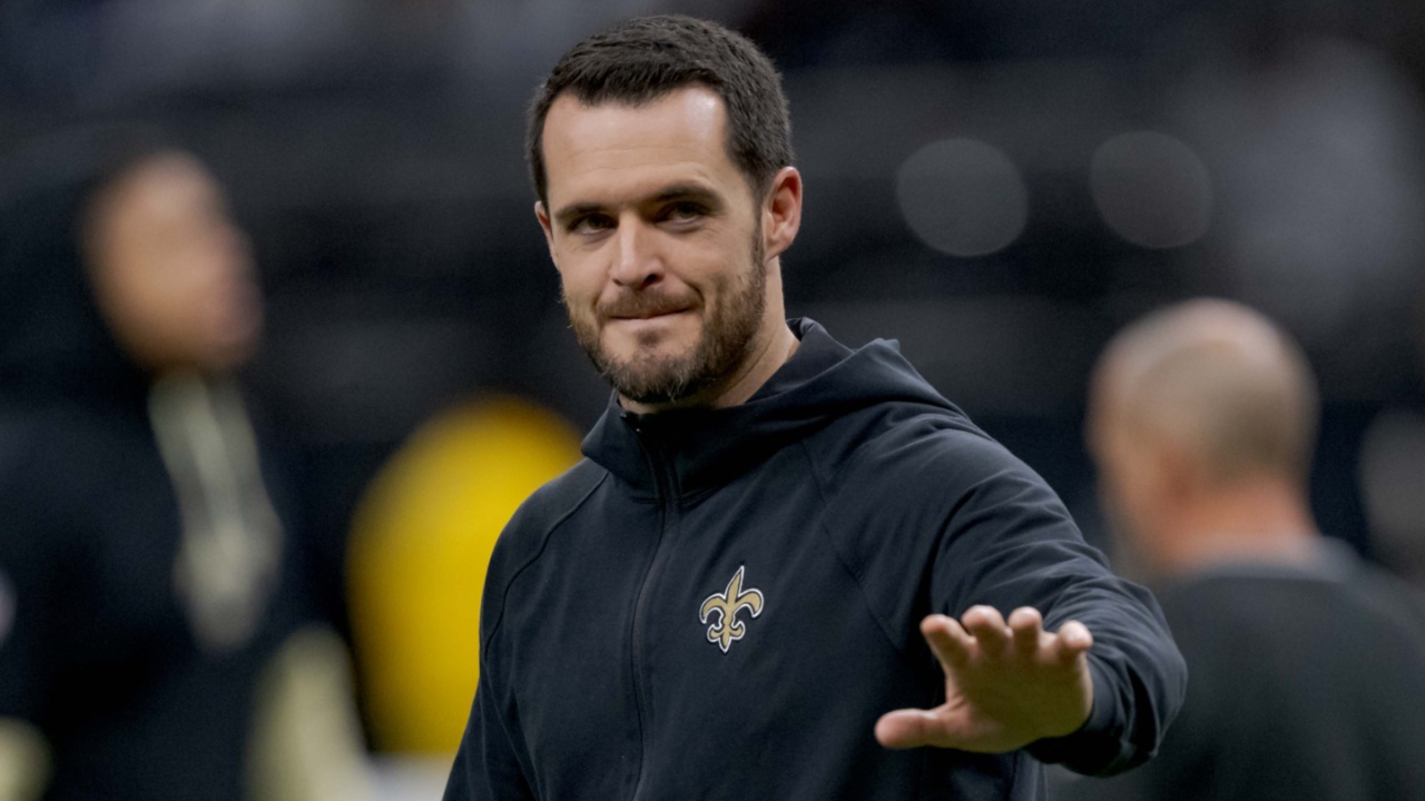 Dec 29, 2024; New Orleans, Louisiana, USA; New Orleans Saints quarterback Derek Carr (4) walks the field before a game against the Las Vegas Raiders at Caesars Superdome.