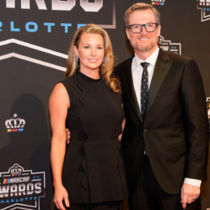 Nov 22, 2024; Charlotte, NC, USA; Dale Earnhardt Jr. and wife Amy during the NASCAR Awards Banquet at Charlotte Convention Center. Mandatory Credit: Jim Dedmon-Imagn Images
