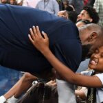 eBron James hugs daughter Zhuri