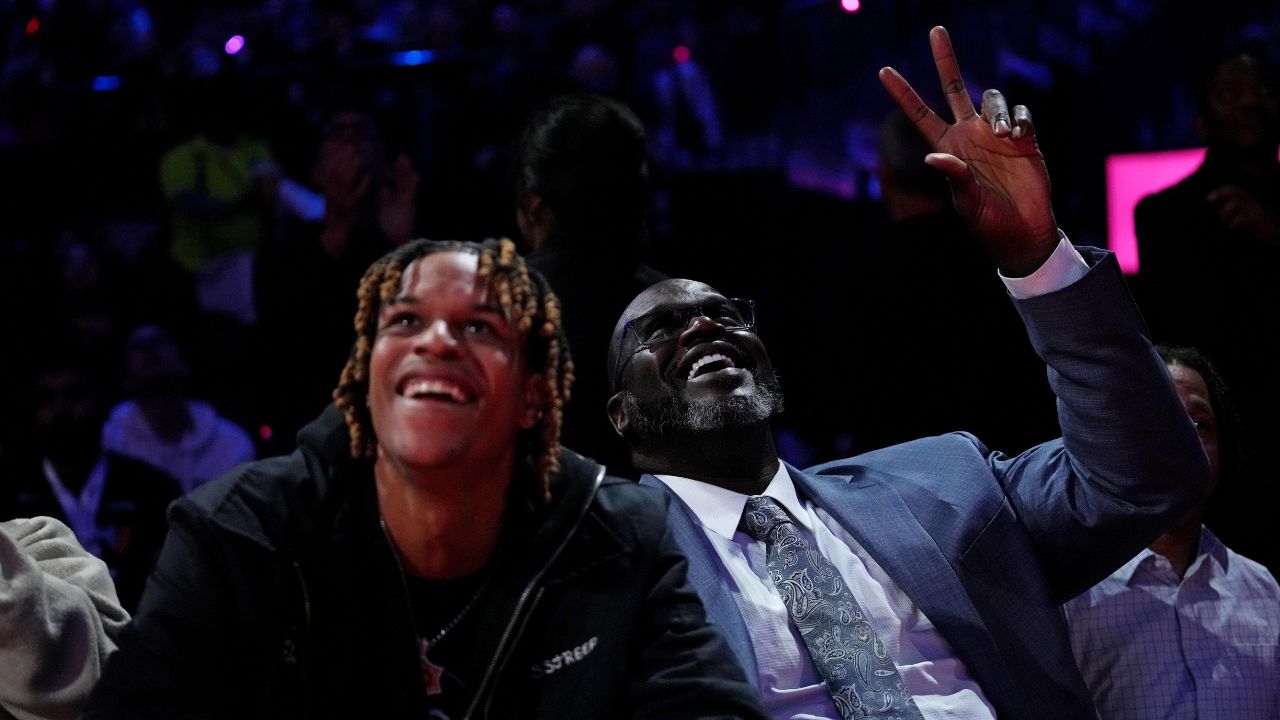 Dec 7, 2023; Las Vegas, Nevada, USA; Shaquille O'Neal sits with his son Shareef O'Neal during the fourth quarter of the game between the New Orleans Pelicans and the Los Angeles Lakers in the NBA In Season Tournament Semifinal at T-Mobile Arena. Mandatory Credit: Kyle Terada-Imagn Images