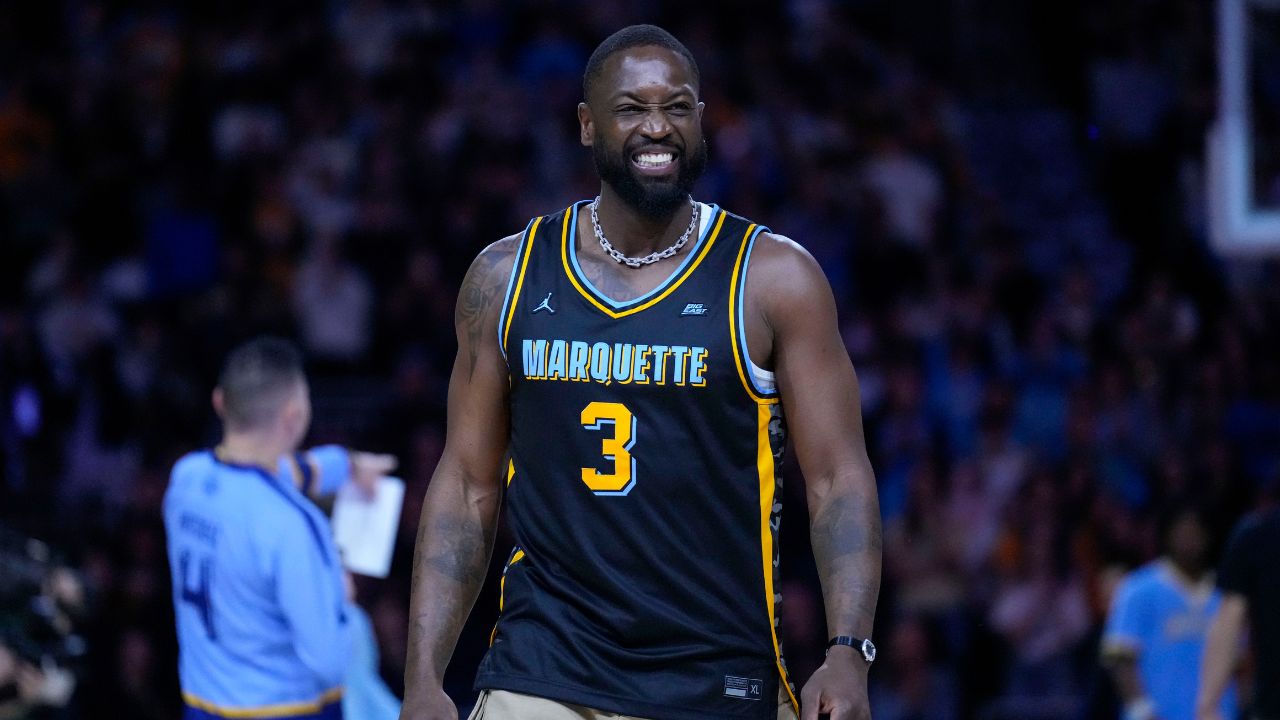 Feb 25, 2025; Milwaukee, Wisconsin, USA; Former Marquette Golden Eagles player Dwyane Wade smiles timeout during the first half of the game against the Providence Friars at Fiserv Forum. Mandatory Credit: Jeff Hanisch-Imagn Images