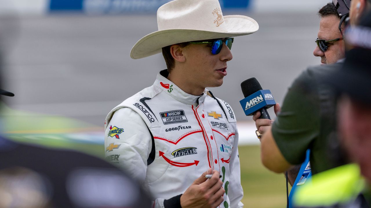 NASCAR Cup Series driver Carson Hocevar (77) talks with the media during Jack Link's 500 qualifying at Talladega Superspeedway.