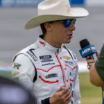 NASCAR Cup Series driver Carson Hocevar (77) talks with the media during Jack Link's 500 qualifying at Talladega Superspeedway.