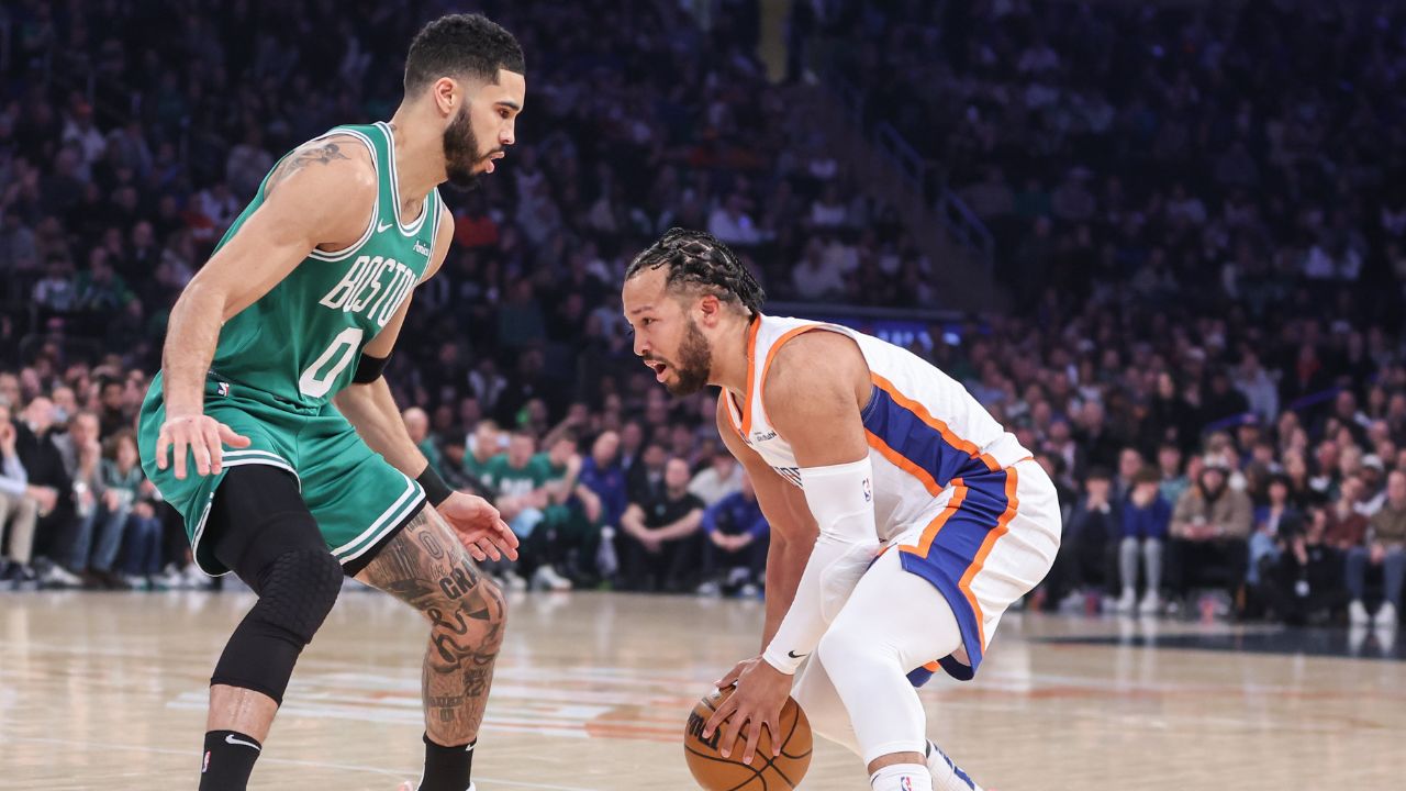 New York Knicks guard Jalen Brunson (11) looks to drive past Boston Celtics forward Jayson Tatum (0) in the first quarter at Madison Square Garden.