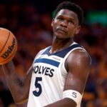May 12, 2025; San Francisco, California, USA; Minnesota Timberwolves guard Anthony Edwards (5) holds onto the ball after being called for a foul against the Golden State Warriors in the third quarter during game four of the second round for the 2025 NBA Playoffs at Chase Center.